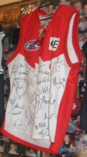 The Sydney Swans donate a signed jumper to the Bushfire Bash - the Vietnam Swans Vs Bali Geckos
